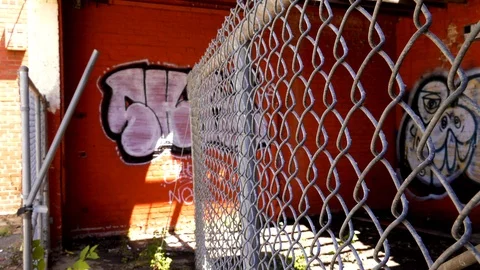Graffiti thru Fence Video stock 115944237