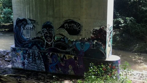 GRAFFITI UNDER A BRIDGE Stock Footage 96544910