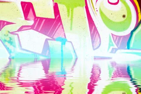 Graffiti wall background reflection in  water, artistic urban picture Illustrazione stock
