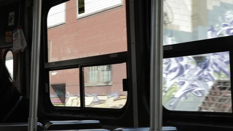 Graffiti on Wall From Bus Window Stock Footage 109615154