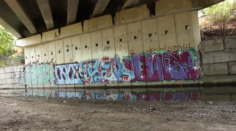 Graffiti wall. Reflection of graffiti in the water. Video stock 42682038