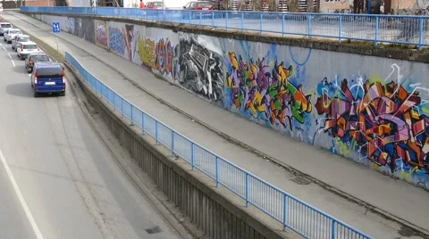 Graffiti Wall With Traffick In The Background Stock Footage 47305340