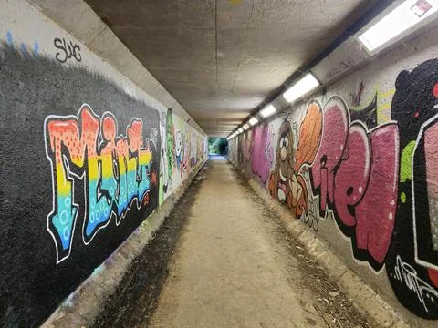 Graffiti on the wall of an underpass Stock Photos