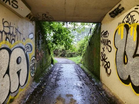 Graffiti on the wall of an underpass Stock Photos