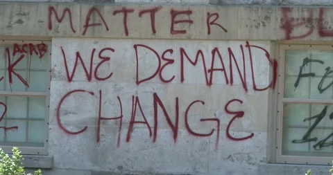 Graffiti on Wall - WE DEMAND CHANGE Stock Footage 135465929