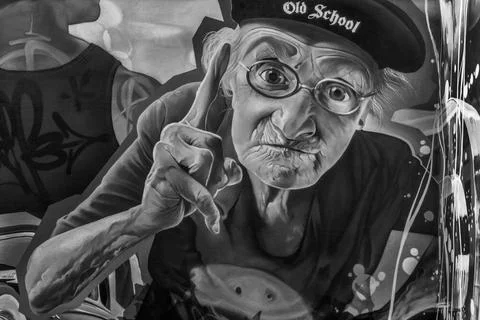 Graffito - Mann mit erhobener Hand: Jetzt mal aufgepasst... Graffito - Man... Stock Photos