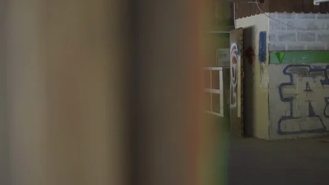 Graffitti all over the wall of abandoned property Stock Footage 102225891