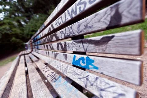Grafitti covered bench Stock Photos