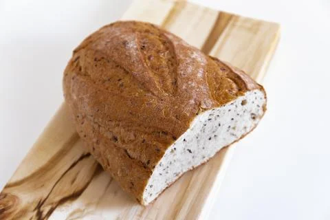 Grain bread on the cutting Board close-up. Stock Photos