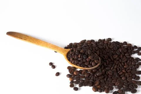 Grain of coffee, beans and spoon Stock Photos