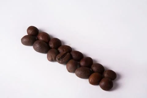 Grain of coffee, beans. White background Stock Photos