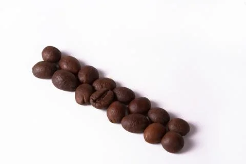 Grain of coffee, beans. White background Stock Photos