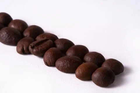 Grain of coffee, beans. White background Stock Photos