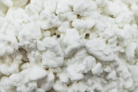 Grain curd. Background of curd grain milk mass close-up Stock Photos