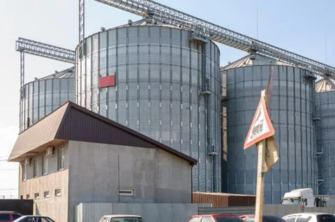 Grain elevator and office building. Stock Photos