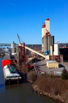 Grain elevator &amp; barge. Stock Photos