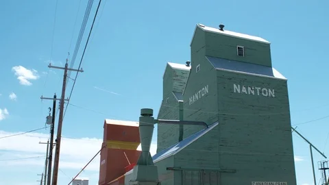 Grain elevator with blue sky Stock Footage 80399724