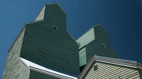 Grain elevator with blue sky Stock Footage 80400125
