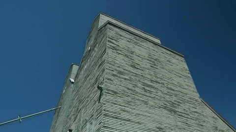 Grain elevator with blue sky Stock Footage 80400343