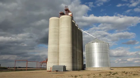 Grain elevator with dramatic clouds. Saskatchewan, Canada. Video stock 42828935