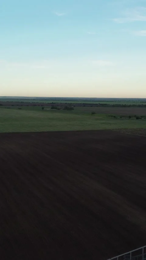 Grain elevator. Metal grain elevator in agricultural zone. Aerial vertical view Stock Footage 275643311
