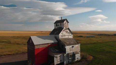 Grain Elevator at Raley, Alberta, Orbiting Aerial drone shot of historical Stock Footage 170804593