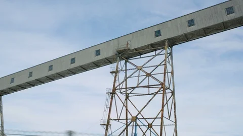 Grain elevator on rusty metal tower structure 스톡 동영상 124243721
