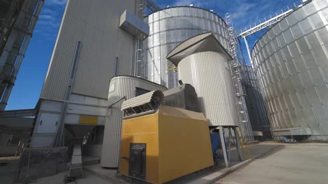 Grain elevator for storage of agricultural crops. Modern silos. Close-up. Stock-Footage 150897802