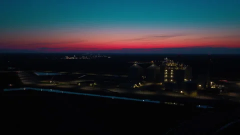 Grain Elevator Storage Silos at Soybean Plant Lit at Dusk Aerial Twilight Stock Footage 337441530