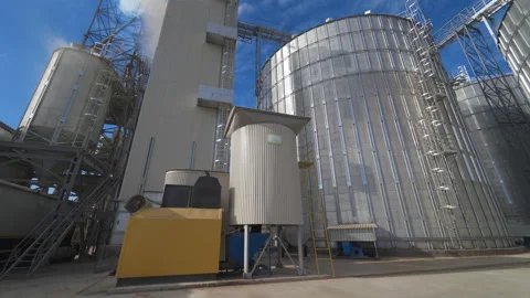 Grain elevator for storing wheat and other cereal grains. Agricultural Silos. Stock Footage 150898087