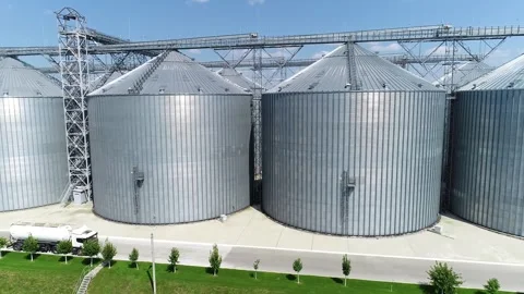 Grain elevators for storing cereals on a large plant. Stock Footage 240294278