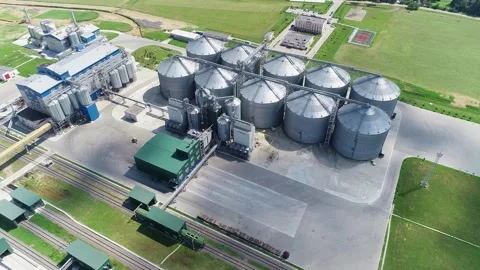 Grain elevators for storing cereals on a large plant. Stock Footage 240294282