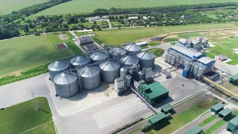 Grain elevators for storing cereals on a large plant. Video stock 240294481