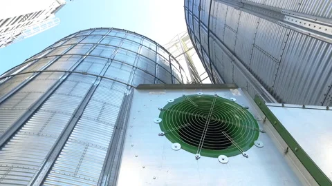 Grain Elevators Under Blue Sky. Huge Metal Grain Storage Tanks. Indonesia Stock Footage 149748053