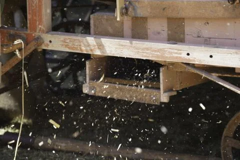 Grain harvest and processing with old equipment Stock Photos