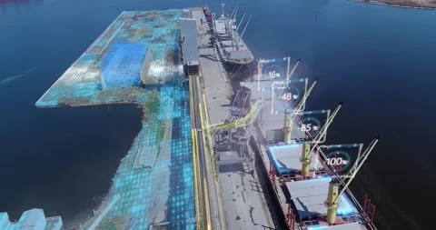 Grain loading in hold of bulk carrier ship with elevator crane closeup. Port 库存影片 332022013