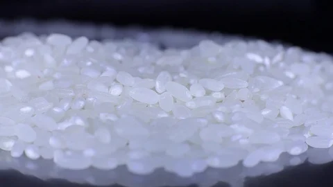Grain of rice on a mirror surface (kitchen)  Stock Footage 82747149