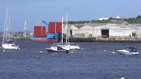Grain ship being unloaded alongside a quay, Plymouth England Stock Footage 137737204