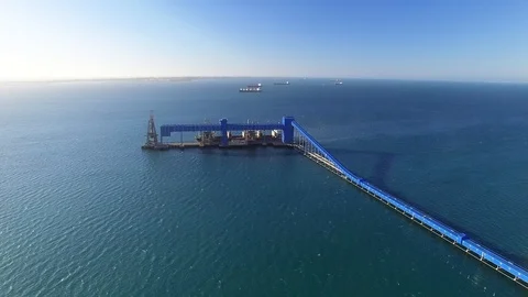 Grain shipping terminal open ocean aerial footage Stock Footage 100009344