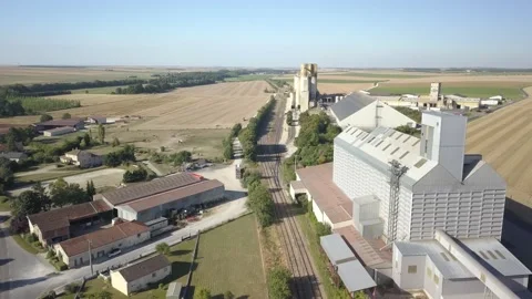 Grain silo and train track aerial view Stock Footage 168388122
