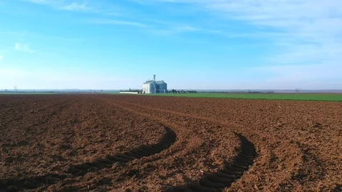 Grain Silo Bins in Farm Field Agricultural Landscape Video stock 88408564
