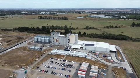 Grain silos and agricultural processing facility Stock Footage 332750080