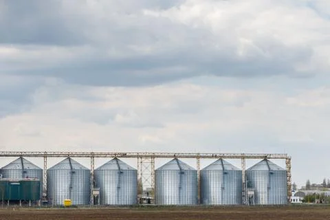 Grain silos in a field Stock-Fotos