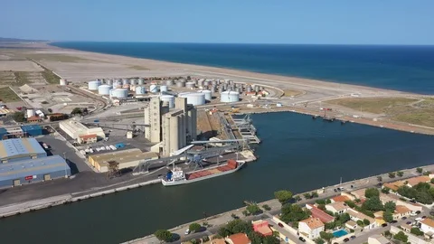 Grain silos grain elevator and stockage tankers aerial shot Port-la-Nouvelle Stock Footage 113414786