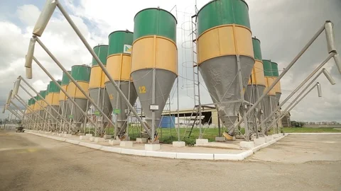 Grain is sucked up into the elevators through flexible tubes Stock Footage 73939563