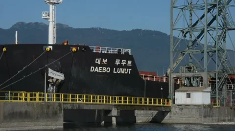 Grain Terminal Cu of bow of ship waiting to be loaded.  Vancouver, BC Canada Stock Footage 53049399