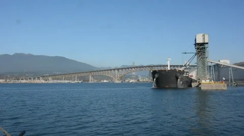 Grain Terminal WS of ship being loaded with grain.  Showing harbour Vancouver Stock Footage 53049223