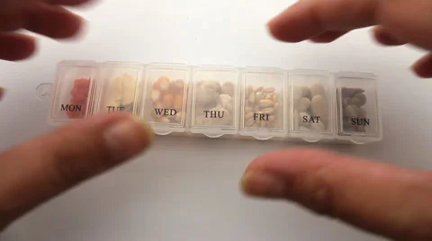 Grains in Pill Box Stock Footage 39732976