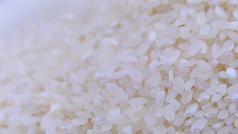 Grains of Raw Rice Rotate Close-up Stock Footage 103676067