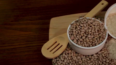 Grains of rice and beans, composition with rotation. Stock Footage 133898275